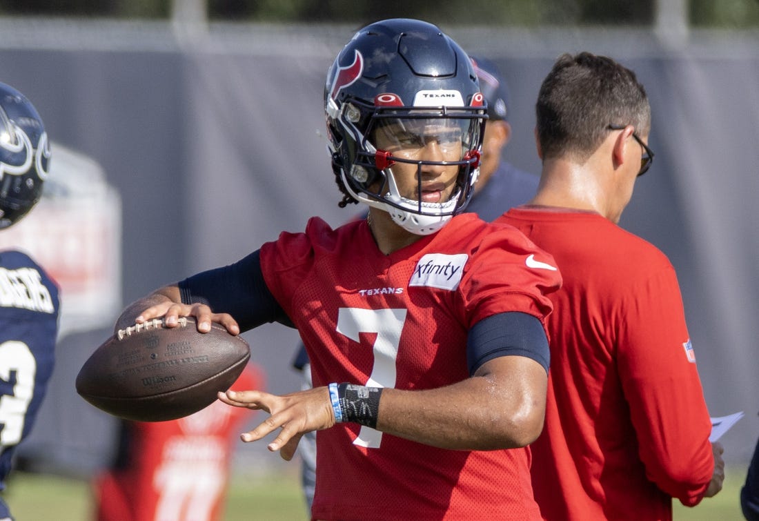 Jul 28, 2023; Houston, TX, USA; Houston Texans quarterback C.J. Stroud (7) drops back to pass during training camp at the Houston Methodist Training Center. Mandatory Credit: Thomas Shea-USA TODAY Sports