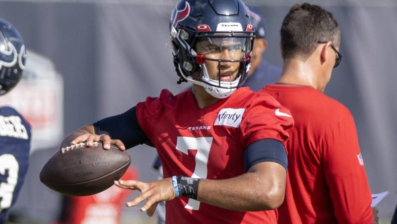 Jul 28, 2023; Houston, TX, USA; Houston Texans quarterback C.J. Stroud (7) drops back to pass during training camp at the Houston Methodist Training Center. Mandatory Credit: Thomas Shea-USA TODAY Sports