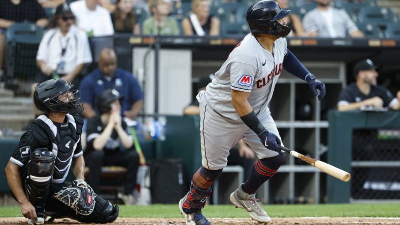 Jul 28, 2023; Chicago, Illinois, USA; Cleveland Guardians first baseman Josh Naylor (22) watches his single against the Chicago White Sox during the fourth inning at Guaranteed Rate Field. Mandatory Credit: Kamil Krzaczynski-USA TODAY Sports