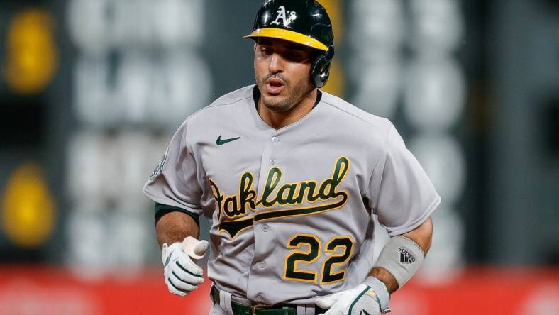 Jul 28, 2023; Denver, Colorado, USA; Oakland Athletics right fielder Ramon Laureano (22) rounds the bases on a solo home run in the ninth inning against the Colorado Rockies at Coors Field. Mandatory Credit: Isaiah J. Downing-USA TODAY Sports