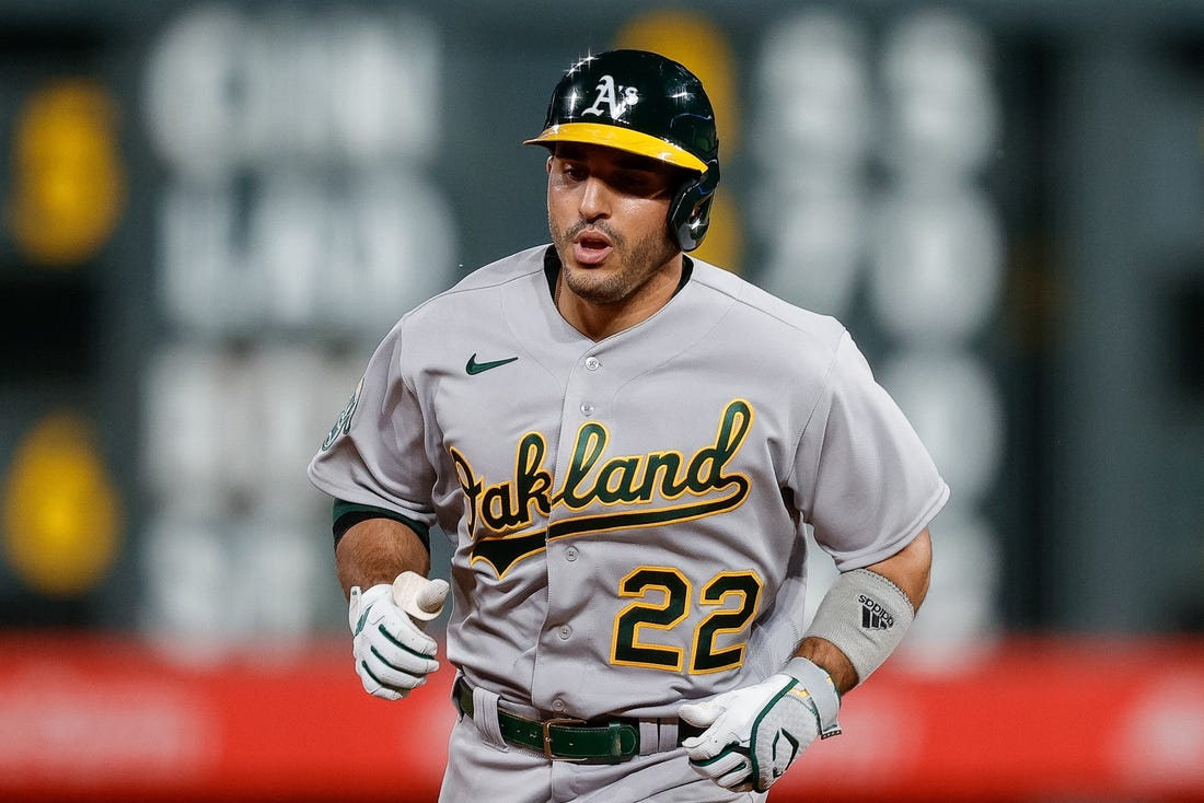 Jul 28, 2023; Denver, Colorado, USA; Oakland Athletics right fielder Ramon Laureano (22) rounds the bases on a solo home run in the ninth inning against the Colorado Rockies at Coors Field. Mandatory Credit: Isaiah J. Downing-USA TODAY Sports