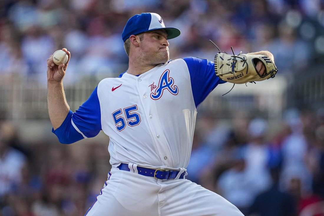 Jul 29, 2023; Cumberland, Georgia, USA; Atlanta Braves starting pitcher Bryce Elder (55) pitches against the Milwaukee Brewers during the first inning at Truist Park. Mandatory Credit: Dale Zanine-USA TODAY Sports