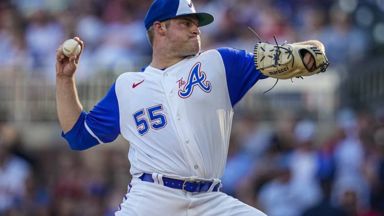 Jul 29, 2023; Cumberland, Georgia, USA; Atlanta Braves starting pitcher Bryce Elder (55) pitches against the Milwaukee Brewers during the first inning at Truist Park. Mandatory Credit: Dale Zanine-USA TODAY Sports