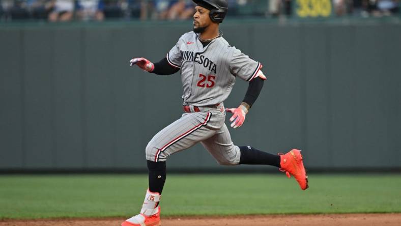 Jul 29, 2023; Kansas City, Missouri, USA;  Minnesota Twins designated hitter Byron Buxton (25) doubles during the sixth inning against the Kansas City Royals at Kauffman Stadium. Mandatory Credit: Peter Aiken-USA TODAY Sports