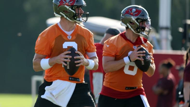 Jul 30, 2023; Tampa, FL, USA; Tampa Bay Buccaneers quarterback Kyle Trask (2) and Tampa Bay Buccaneers quarterback Baker Mayfield (6) work out during training camp at AdventHealth Training Center. Mandatory Credit: Kim Klement-USA TODAY Sports