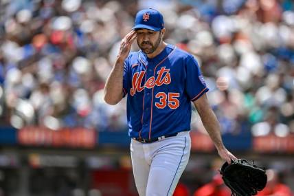 Jul 30, 2023; New York City, New York, USA; New York Mets starting pitcher Justin Verlander (35) walks to the dugout during the fourth inning against the Washington Nationals at Citi Field. Mandatory Credit: John Jones-USA TODAY Sports