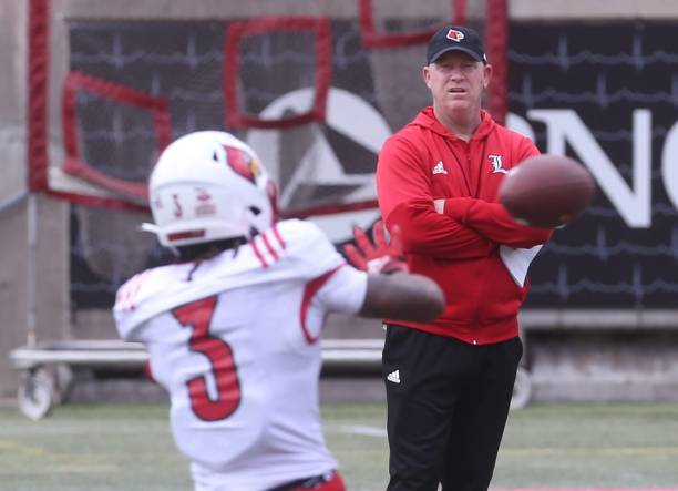 Louisville   s coach Jeff Brohm watches Kevin Coleman catch the ball on April 14, 2023 during the Cardinals' final open practice before their spring game.