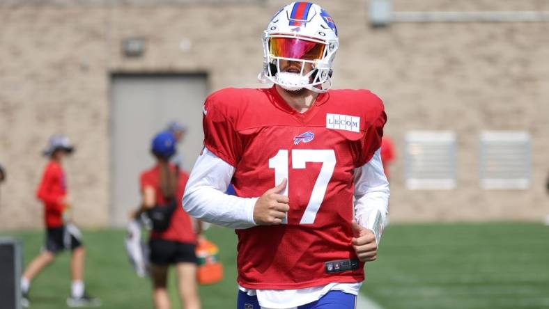 Bills quarterback Josh Allen heads to the main practice field from back field during training camp.