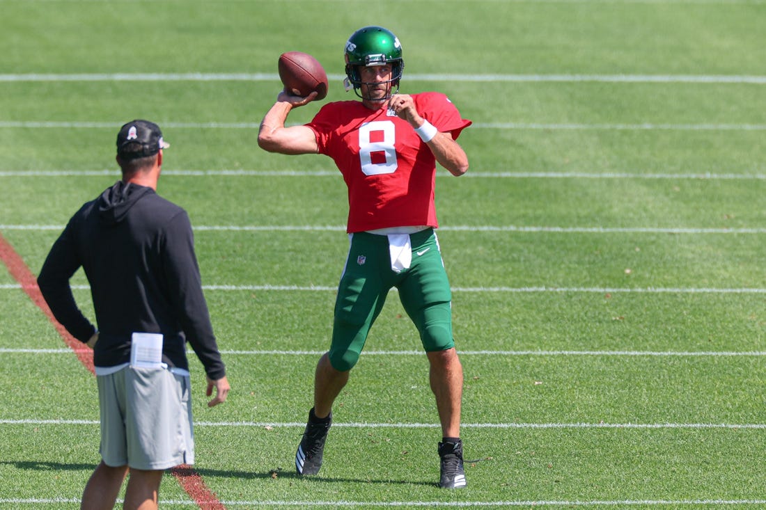 Jul 31, 2023; Florham Park, NY, USA; New York Jets quarterback Aaron Rodgers (8) participates in drills during the New York Jets Training Camp at Atlantic Health Jets Training Center.  Mandatory Credit: Vincent Carchietta-USA TODAY Sports