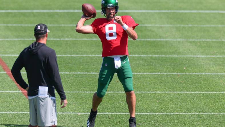 Jul 31, 2023; Florham Park, NY, USA; New York Jets quarterback Aaron Rodgers (8) participates in drills during the New York Jets Training Camp at Atlantic Health Jets Training Center.  Mandatory Credit: Vincent Carchietta-USA TODAY Sports