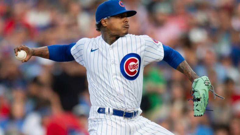 Jul 31, 2023; Chicago, Illinois, USA; Chicago Cubs starting pitcher Marcus Stroman (0) pitches during the first inning against the Cincinnati Reds at Wrigley Field. Mandatory Credit: Patrick Gorski-USA TODAY Sports