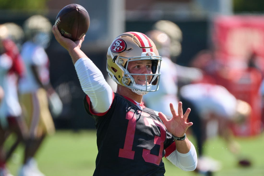 Jul 27, 2023; Santa Clara, CA, USA; San Francisco 49ers quarterback Brock Purdy (13) throws a pass during training camp at the SAP Performance Facility. Mandatory Credit: Robert Edwards-USA TODAY Sports