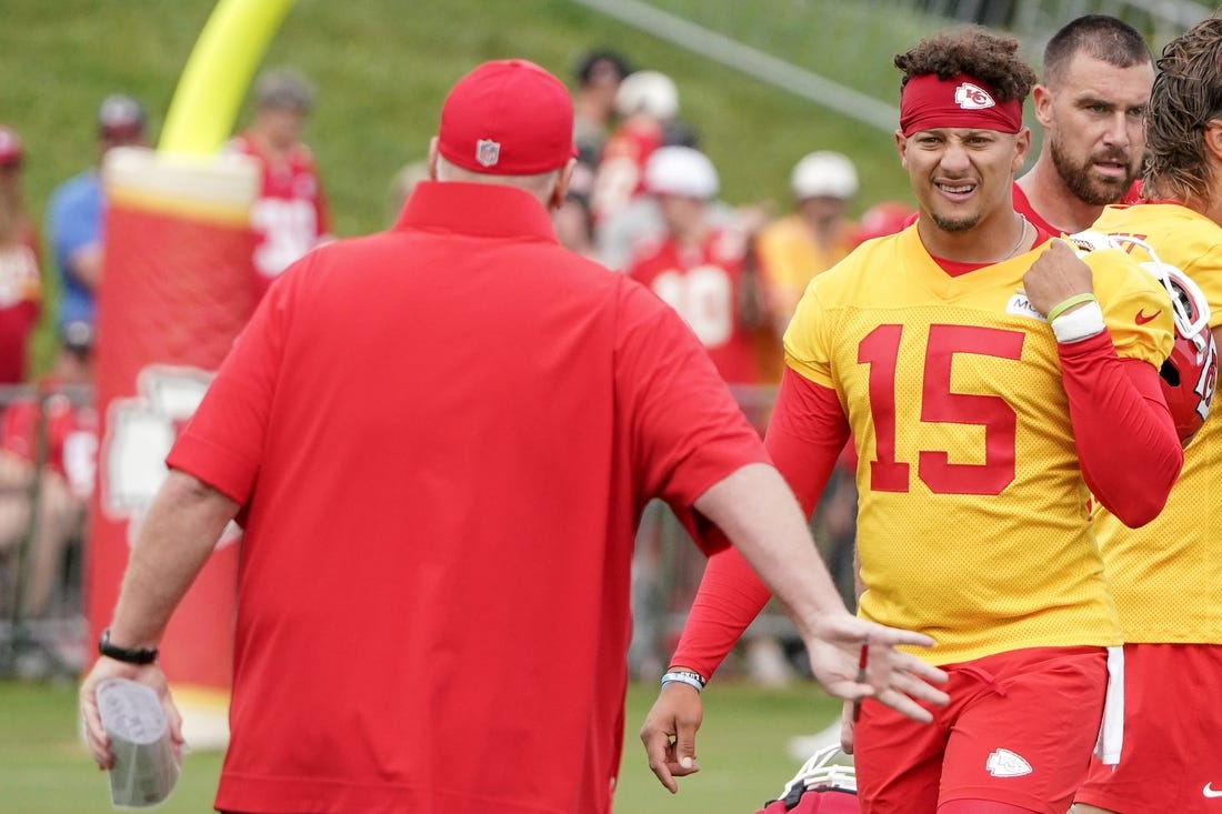 Jul 24, 2023; St. Joseph, MO, USA; Kansas City Chiefs head coach Andy Reid talks with quarterback Patrick Mahomes (15) during training camp at Missouri Western State University. Mandatory Credit: Denny Medley-USA TODAY Sports