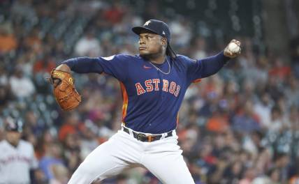 Aug 1, 2023; Houston, Texas, USA; Houston Astros starting pitcher Framber Valdez (59) delivers a pitch during the first inning against the Cleveland Guardians at Minute Maid Park. Mandatory Credit: Troy Taormina-USA TODAY Sports