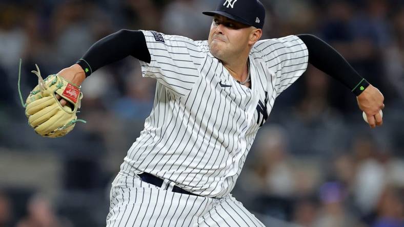 Aug 1, 2023; Bronx, New York, USA; New York Yankees relief pitcher Nick Ramirez (63) pitches against the Tampa Bay Rays during the ninth inning at Yankee Stadium. Mandatory Credit: Brad Penner-USA TODAY Sports