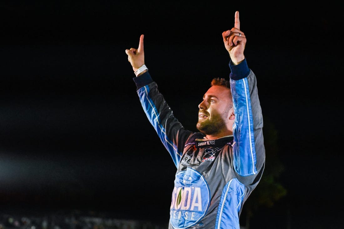 Ty Majeski (91) celebrates his victory in the Gandrud Auto Group 250 on Tuesday, August 1, 2023, at Wisconsin International Raceway in Kaukauna, Wisconsin.