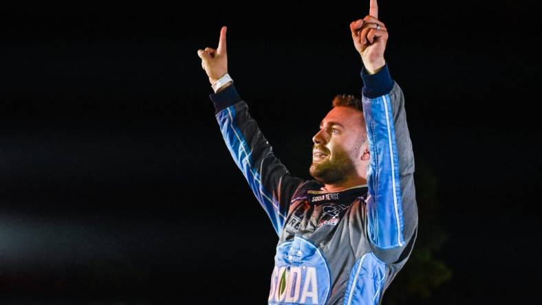 Ty Majeski (91) celebrates his victory in the Gandrud Auto Group 250 on Tuesday, August 1, 2023, at Wisconsin International Raceway in Kaukauna, Wisconsin.