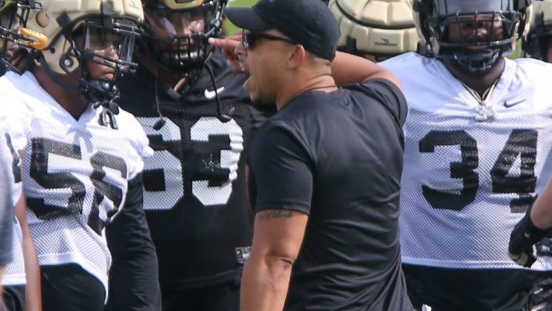 Purdue Boilermakers head coach Ryan Walters coaches players during Purdue football practice, Wednesday, August 2, 2023, at Purdue University in West Lafayette, Ind.