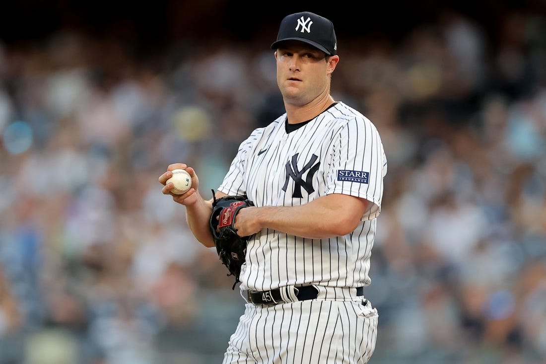 Aug 2, 2023; Bronx, New York, USA; New York Yankees starting pitcher Gerrit Cole (45) reacts during the first inning against the Tampa Bay Rays at Yankee Stadium. Mandatory Credit: Brad Penner-USA TODAY Sports