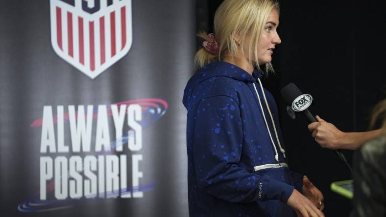 Aug 3, 2023; Auckland, NZL;  United States midfielder Lindsey Horan (10) does a television interview after a press conference amid the 2023 FIFA Women's World Cup. Mandatory Credit: Jenna Watson-USA TODAY Sports