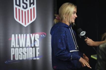Aug 3, 2023; Auckland, NZL;  United States midfielder Lindsey Horan (10) does a television interview after a press conference amid the 2023 FIFA Women's World Cup. Mandatory Credit: Jenna Watson-USA TODAY Sports