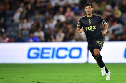 August 2, 2023; Los Angeles, CA, USA; Los Angeles FC forward Carlos Vela (10) in action against FC Juarez during the first half at BMO Stadium. Mandatory Credit: Gary A. Vasquez-USA TODAY Sports