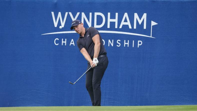 Aug 3, 2023; Greensboro, North Carolina, USA; Matt Wallace plays on the fifteenth green during the first round of the Wyndham Championship golf tournament. Mandatory Credit: David Yeazell-USA TODAY Sports