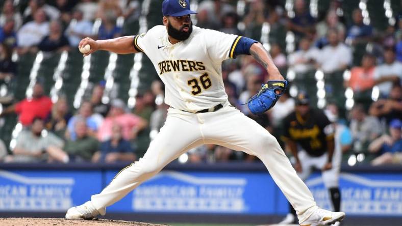 Aug 3, 2023; Milwaukee, Wisconsin, USA; Milwaukee Brewers relief pitcher J.C. Mejia (36) delivers a pitch against the Pittsburgh Pirates in the eighth inning at American Family Field. Mandatory Credit: Michael McLoone-USA TODAY Sports