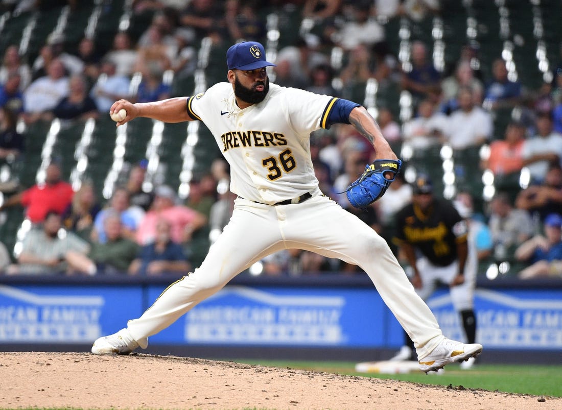 Aug 3, 2023; Milwaukee, Wisconsin, USA; Milwaukee Brewers relief pitcher J.C. Mejia (36) delivers a pitch against the Pittsburgh Pirates in the eighth inning at American Family Field. Mandatory Credit: Michael McLoone-USA TODAY Sports