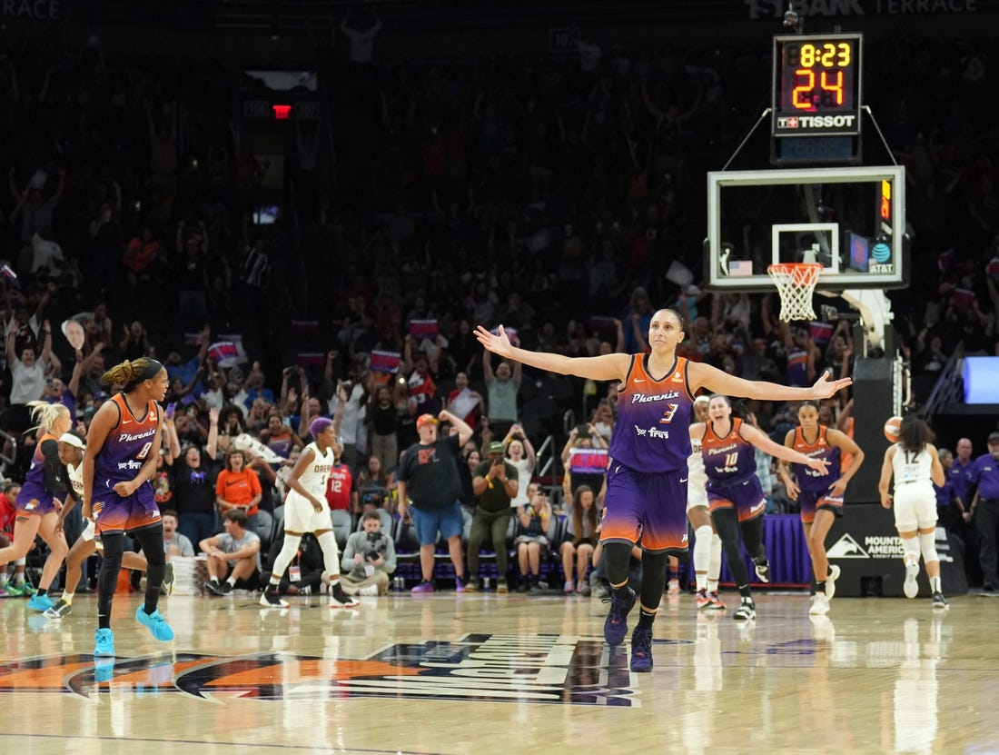 Aug 3, 2023; Phoenix, Arizona, USA; Phoenix Mercury guard Diana Taurasi (3) celebrates her 10,000th career point during the second half of the game against the Atlanta Dream at Footprint Center. Mandatory Credit: Joe Camporeale-USA TODAY Sports