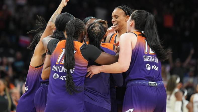 Aug 3, 2023; Phoenix, Arizona, USA; Phoenix Mercury guard Diana Taurasi (3) celebrates her 10,000th career point during the second half of the game against the Atlanta Dream at Footprint Center. Mandatory Credit: Joe Camporeale-USA TODAY Sports