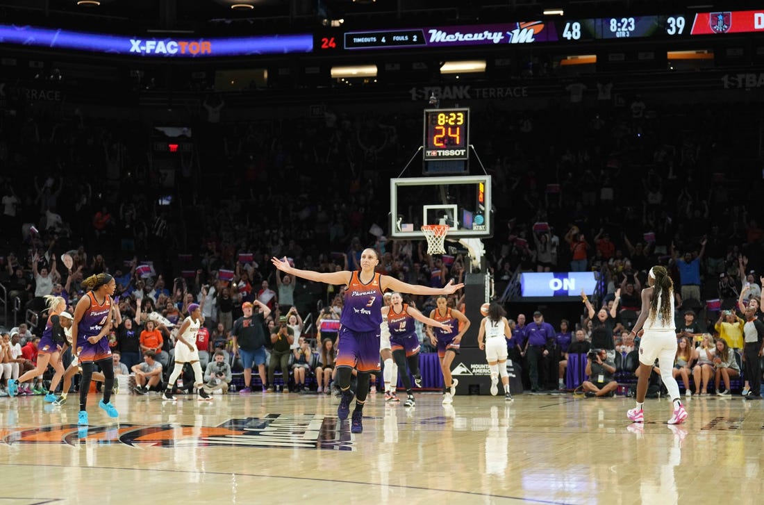 Aug 3, 2023; Phoenix, Arizona, USA; Phoenix Mercury guard Diana Taurasi (3) celebrates her 10,000th career point during the second half of the game against the Atlanta Dream at Footprint Center. Mandatory Credit: Joe Camporeale-USA TODAY Sports