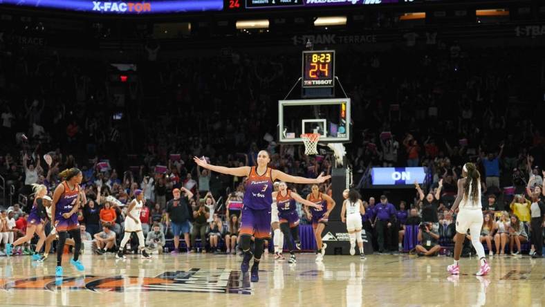 Aug 3, 2023; Phoenix, Arizona, USA; Phoenix Mercury guard Diana Taurasi (3) celebrates her 10,000th career point during the second half of the game against the Atlanta Dream at Footprint Center. Mandatory Credit: Joe Camporeale-USA TODAY Sports