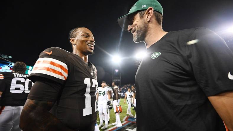 Aug 3, 2023; Canton, Ohio, USA; Cleveland Browns quarterback Dorian Thompson-Robinson (17) talks to New York Jets quarterback Aaron Rodgers (8) after the game at Tom Benson Hall of Fame Stadium. Mandatory Credit: Ken Blaze-USA TODAY Sports