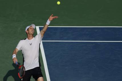 Aug 4, 2023; Washington, D.C., USA; Andy Murray (GBR) serves against Taylor Fritz (USA) (not pictured) on day seven of the Mubadala Citi DC Open at Fitzgerald Tennis Stadium. Mandatory Credit: Geoff Burke-USA TODAY Sports