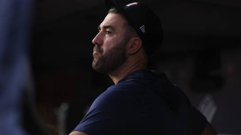 Aug 4, 2023; Bronx, New York, USA; Houston Astros starting pitcher Justin Verlander (35) looks on from the dugout during the third inning against the New York Yankee at Yankee Stadium. Mandatory Credit: Vincent Carchietta-USA TODAY Sports