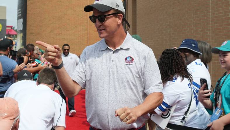 Aug 5, 2023; Canton, OH, USA; Peyton Manning arrives on the red carpet for the 2023 Pro Football Hall of Fame Enshrinement at Tom Benson Hall of Fame Stadium. Mandatory Credit: Kirby Lee-USA TODAY Sports