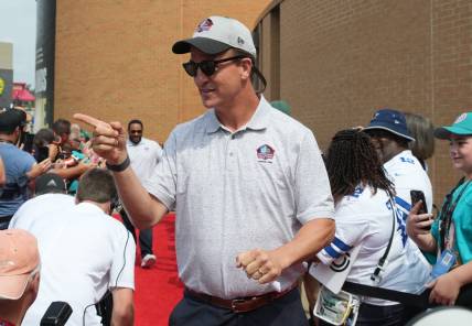 Aug 5, 2023; Canton, OH, USA; Peyton Manning arrives on the red carpet for the 2023 Pro Football Hall of Fame Enshrinement at Tom Benson Hall of Fame Stadium. Mandatory Credit: Kirby Lee-USA TODAY Sports