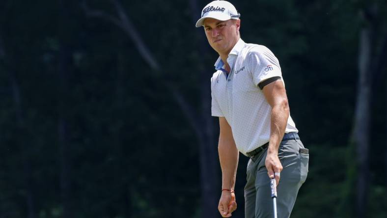 Aug 5, 2023; Greensboro, North Carolina, USA; Justin Thomas reacts to a putt on the 9th green during the third round of the Wyndham Championship golf tournament. Mandatory Credit: David Yeazell-USA TODAY Sports