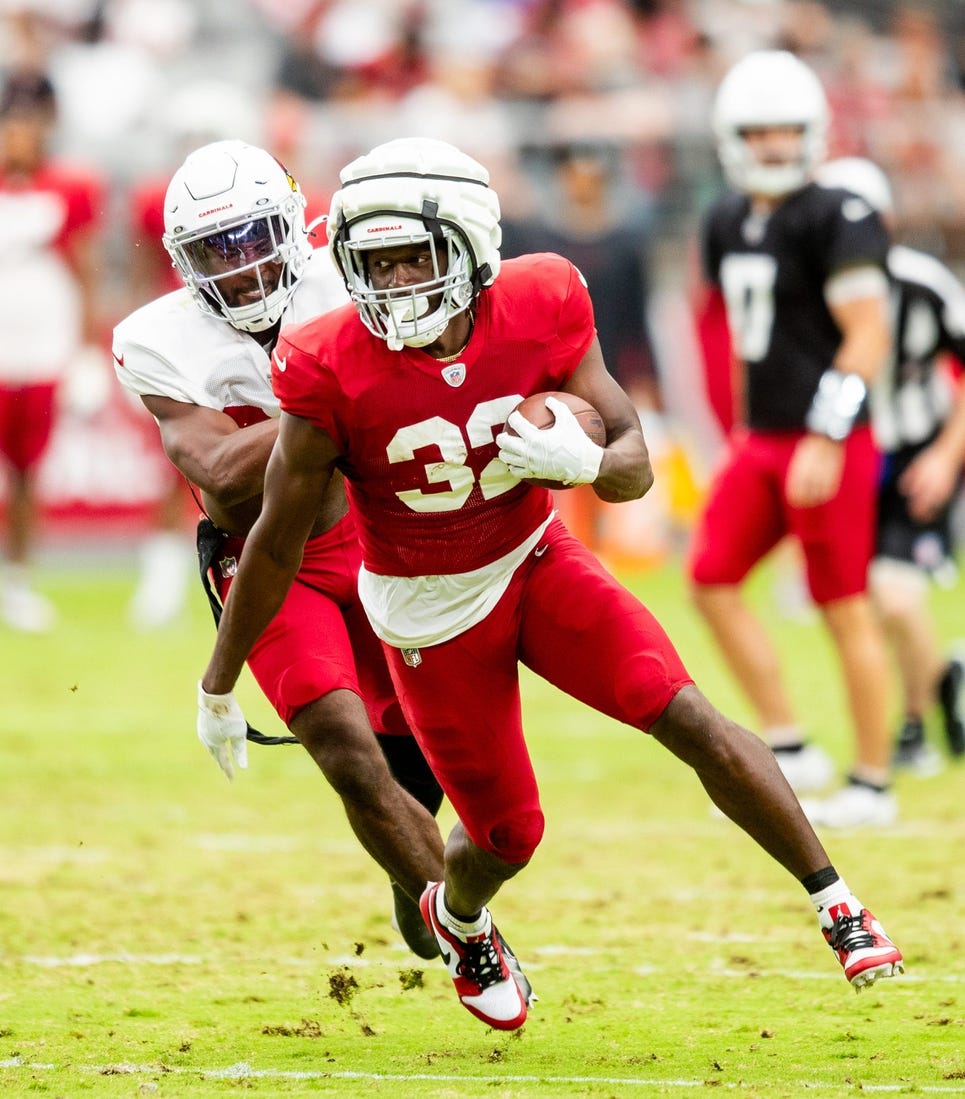 Aug 5, 2023; Phoenix, AZ, United States; RB Marlon Mack runs with the ball during the Arizona Cardinals' annual Red & White practice at State Farm Stadium in Glendale on Saturday, Aug. 5, 2023.
