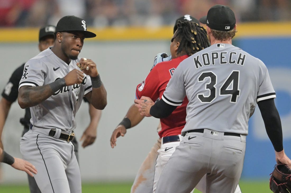 Aug 5, 2023; Cleveland, Ohio, USA; Chicago White Sox shortstop Tim Anderson (7) raises his fists to fight Cleveland Guardians third baseman Jose Ramirez (11) during the sixth inning at Progressive Field. Mandatory Credit: Ken Blaze-USA TODAY Sports