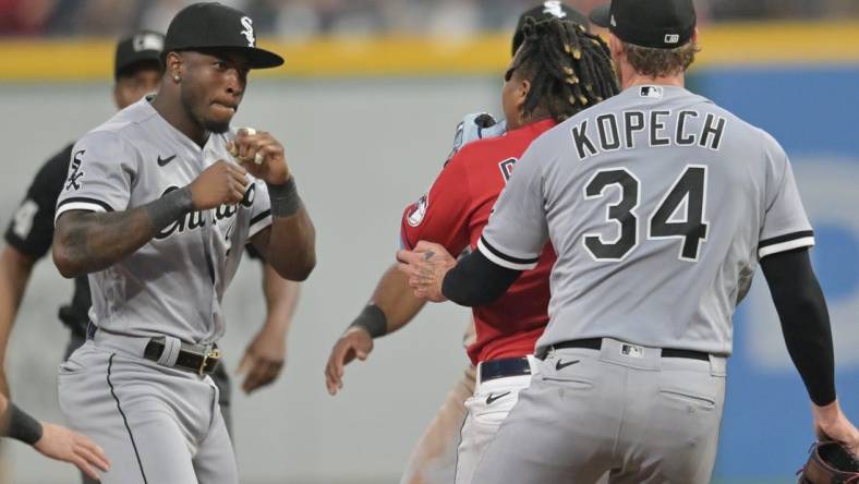 Aug 5, 2023; Cleveland, Ohio, USA; Chicago White Sox shortstop Tim Anderson (7) raises his fists to fight Cleveland Guardians third baseman Jose Ramirez (11) during the sixth inning at Progressive Field. Mandatory Credit: Ken Blaze-USA TODAY Sports