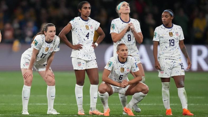 Aug 6, 2023; Melbourne, AUS; United States players midfielder Andi Sullivan (17), defender Naomi Girma (4), forward Lynn Williams (6), midfielder Julie Ertz (8) and defender Crystal Dunn (19) react as Sweden forward Lina Hurtig (not pictured) takes the winning kick in the penalty kick shootout during a Round of 16 match in the 2023 FIFA Women's World Cup at Melbourne Rectangular Stadium. Mandatory Credit: Jenna Watson-USA TODAY Sports