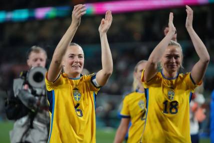 Aug 6, 2023; Melbourne, AUS; Sweden defender Magdalena Eriksson (6) and forward Fridolina Rolfo (18) celebrate after defeating the United States in the penalty kick shootout during a Round of 16 match in the 2023 FIFA Women's World Cup at Melbourne Rectangular Stadium. Mandatory Credit: Jenna Watson-USA TODAY Sports