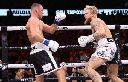 Aug 5, 2023; Dallas, Texas, USA;  Jake Paul (right) fights  against Nate Diaz in a boxing match at American Airlines Center. Mandatory Credit: Kevin Jairaj-USA TODAY Sports