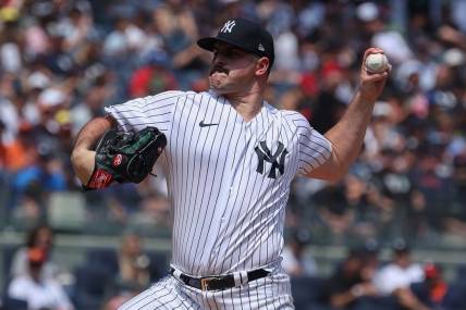 Aug 6, 2023; Bronx, New York, USA; New York Yankees starting pitcher Carlos Rodon (55) delivers a pitch during the first inning against the Houston Astros at Yankee Stadium. Mandatory Credit: Vincent Carchietta-USA TODAY Sports