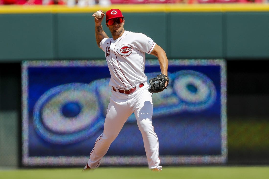 Aug 6, 2023; Cincinnati, Ohio, USA; Cincinnati Reds third baseman Nick Senzel (15) throws to first to get Washington Nationals third baseman Ildemaro Vargas (not pictured) out in the fifth inning at Great American Ball Park. Mandatory Credit: Katie Stratman-USA TODAY Sports