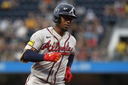 Aug 7, 2023; Pittsburgh, Pennsylvania, USA; Atlanta Braves second baseman Ozzie Albies (1) circles the bases on a solo home run against the Pittsburgh Pirates during the fourth inning at PNC Park. Mandatory Credit: Charles LeClaire-USA TODAY Sports