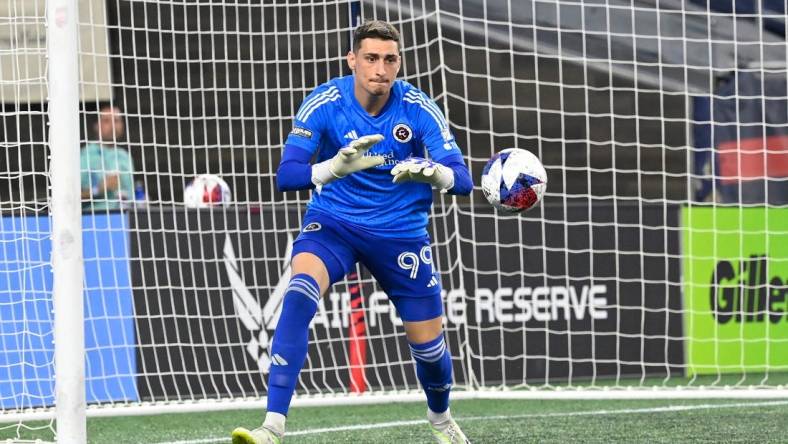 Aug 7, 2023; Foxborough, MA, USA; New England Revolution goalkeeper Djordje Petrovic (99) grabs the ball during the second half against the Queretaro FC at Gillette Stadium. Mandatory Credit: Eric Canha-USA TODAY Sports