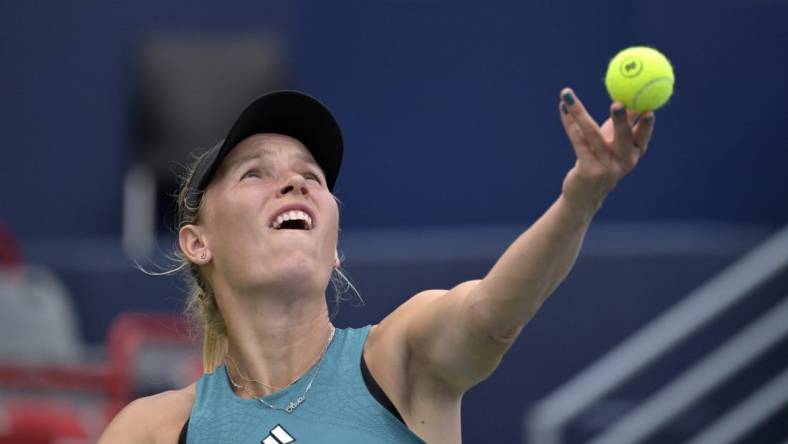 Aug 8, 2023; Montreal, Quebec, Canada; Caroline Wozniacki (DEN) serves against Kimberly Birrell (AUS) (not pictured) during first round play at IGA Stadium. Mandatory Credit: Eric Bolte-USA TODAY Sports